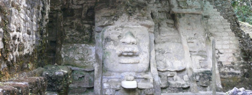 belize mayan temple faces carved in stone