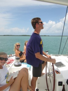 family on catamaran sailing adventure in the islands of belize