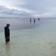 fly fishing in shallows near mangroves in belize