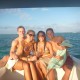 Group photo in Belize relaxing off reef fishing and snorkeling