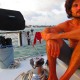 guest relaxing on catamaran outside of san pedro belize