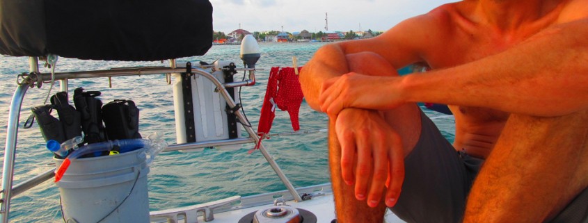 guest relaxing on catamaran outside of san pedro belize