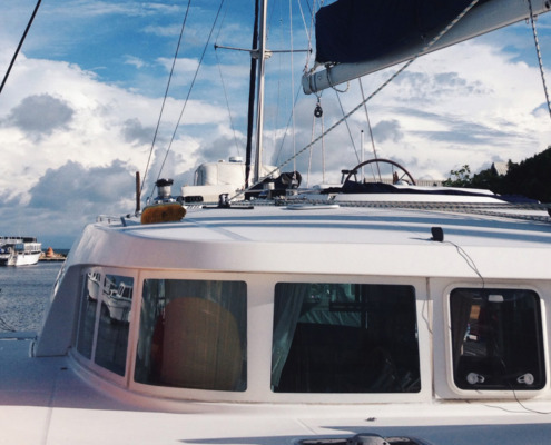 mast and cabin of luxury catamaran on charter with belize sailing vacations