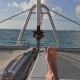 relaxing in sun on catamaran enjoying epic vacation in belize