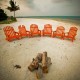 row of chairs near dive resort in belize at sunset