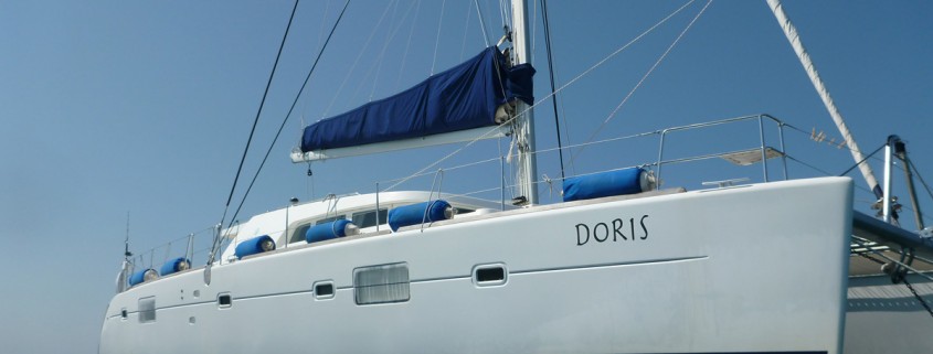 snorkeling next to luxury yacht and catamaran Doris on charter