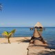 tropical paradise dock and relaxing beach hut in belize