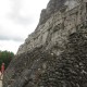 woman explores mayan temple in belize