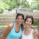 women pose at mayan temple site in belize